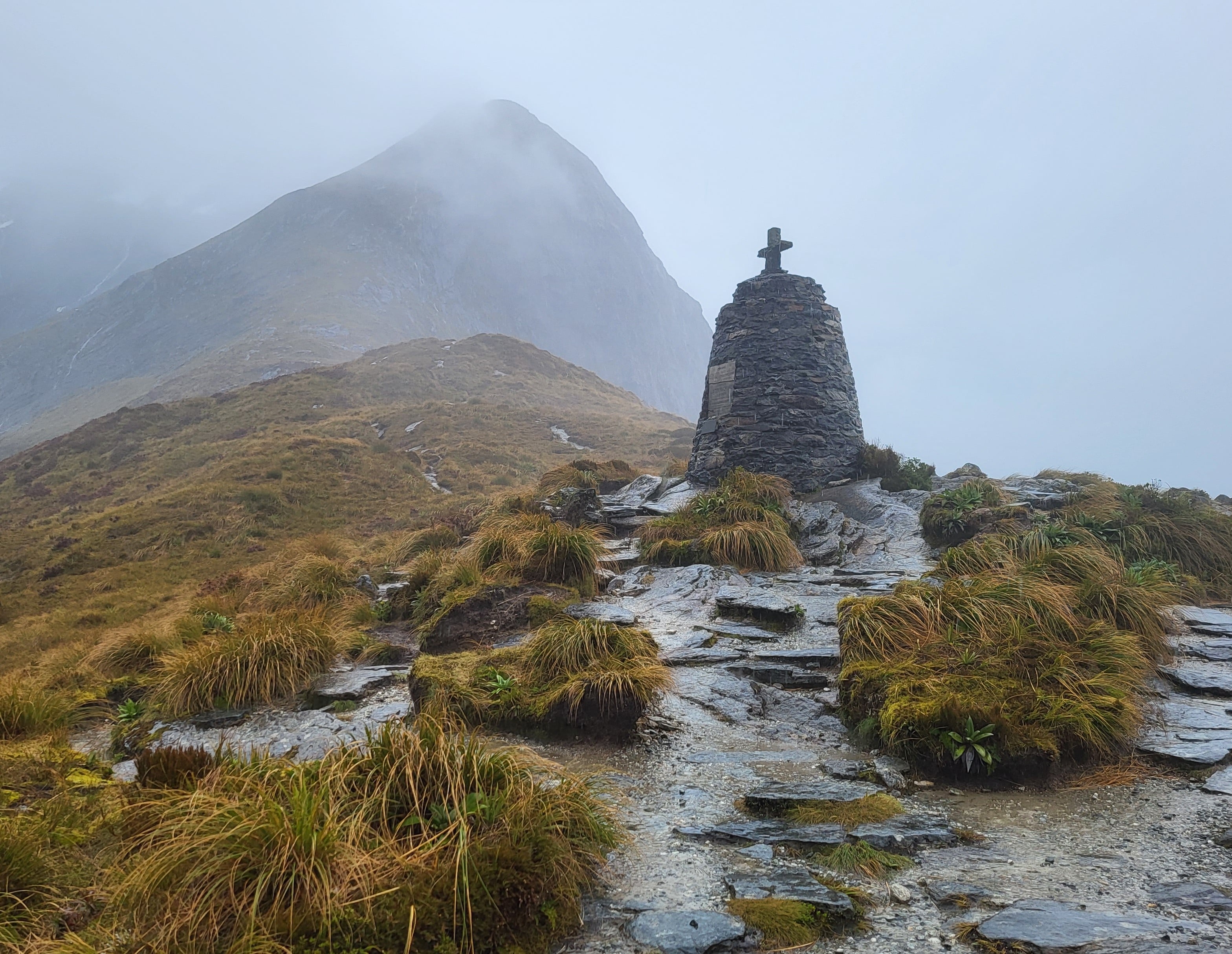 Very foggy view of the McKinnon Pass Memorial