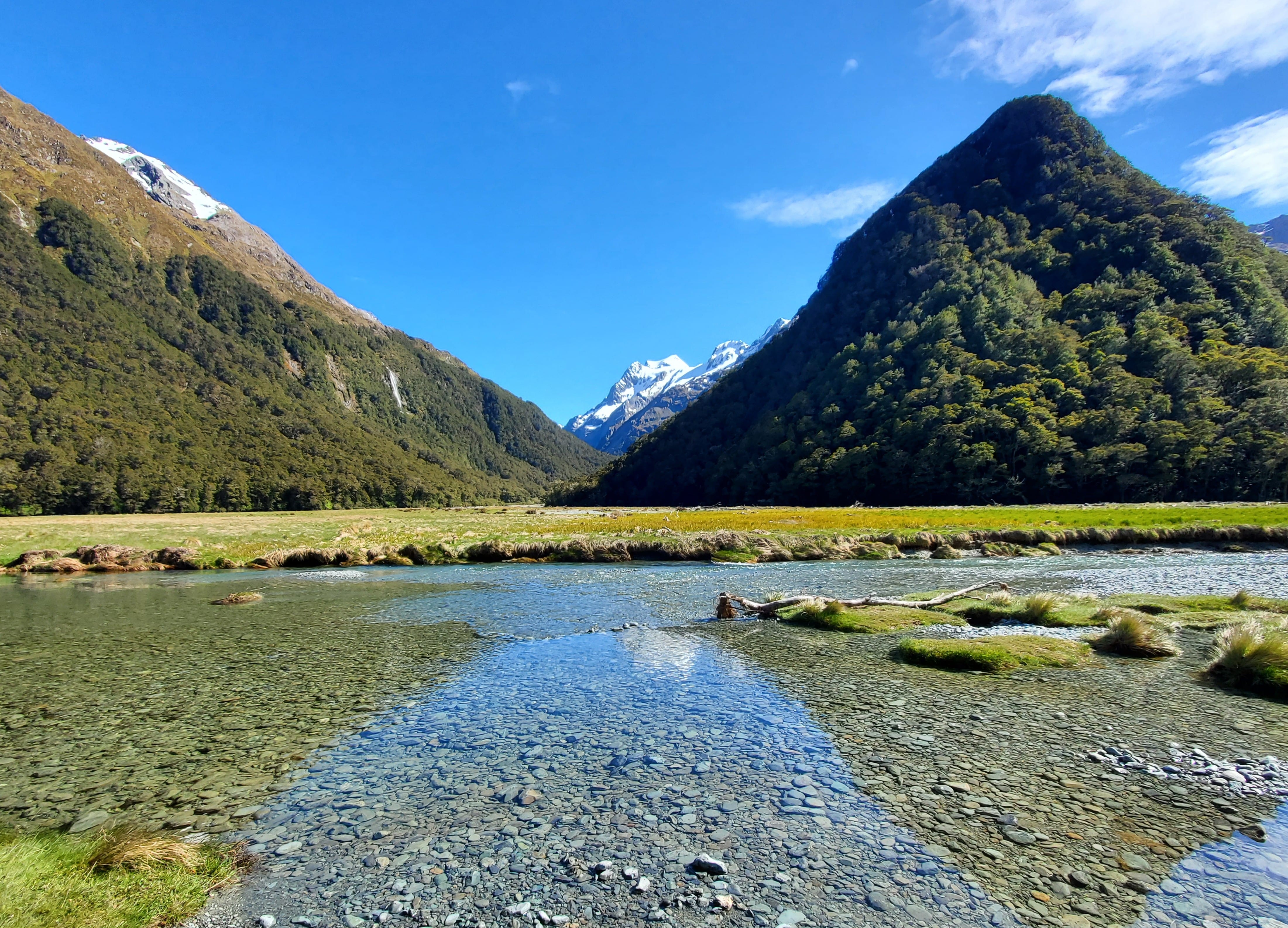 Scenic Routeburn Flats under bright sunlight