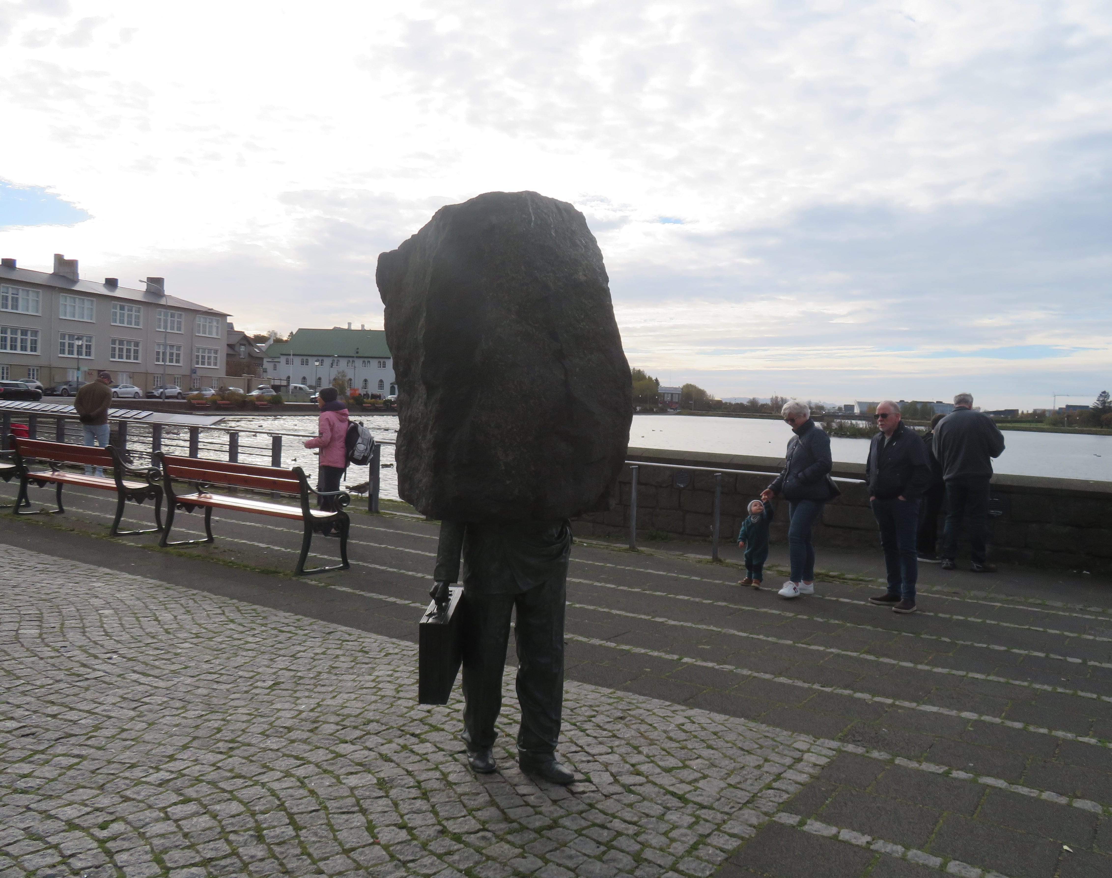 A sculpture by the lake