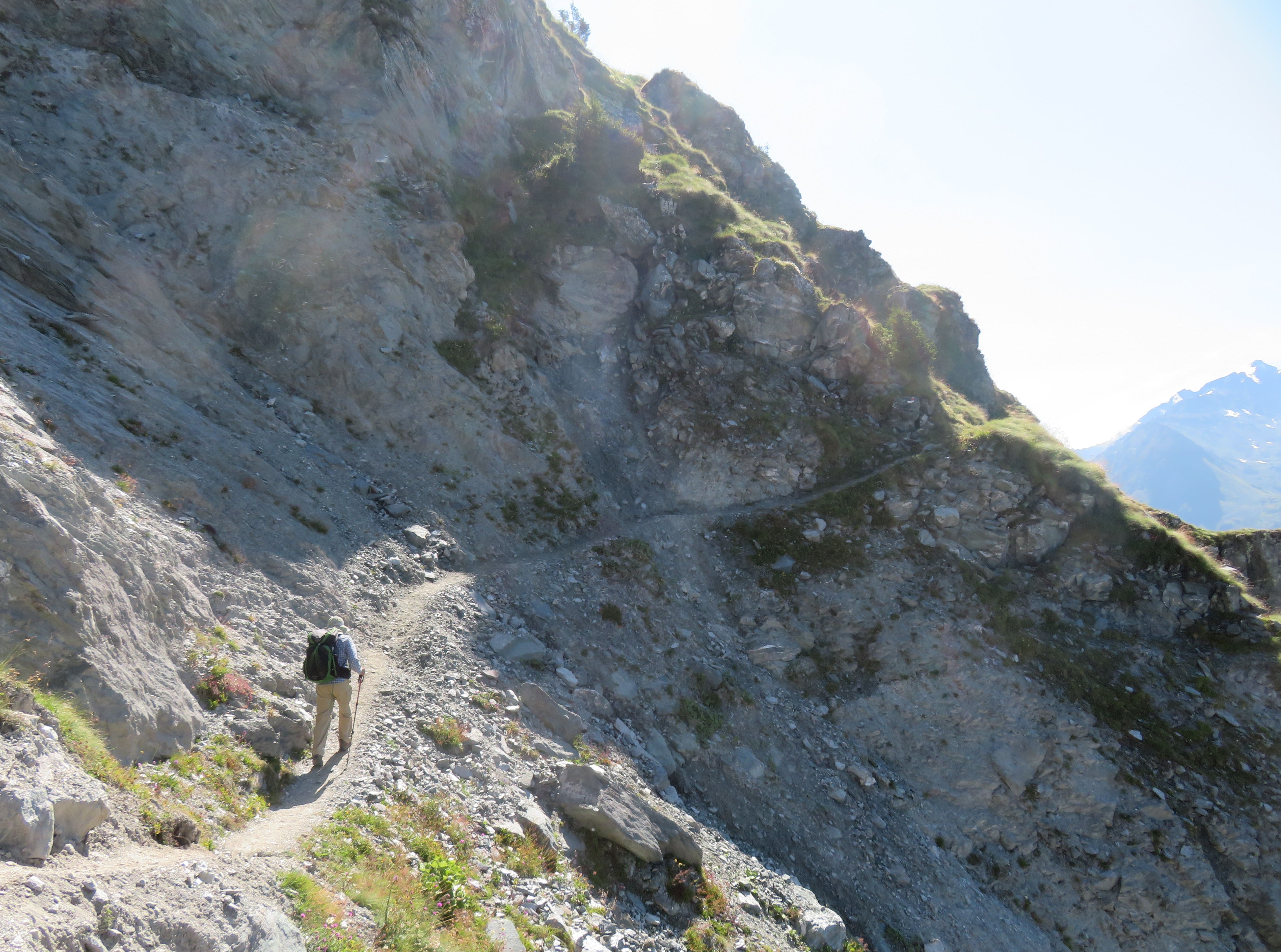 Narrow trail with steep drop on one side