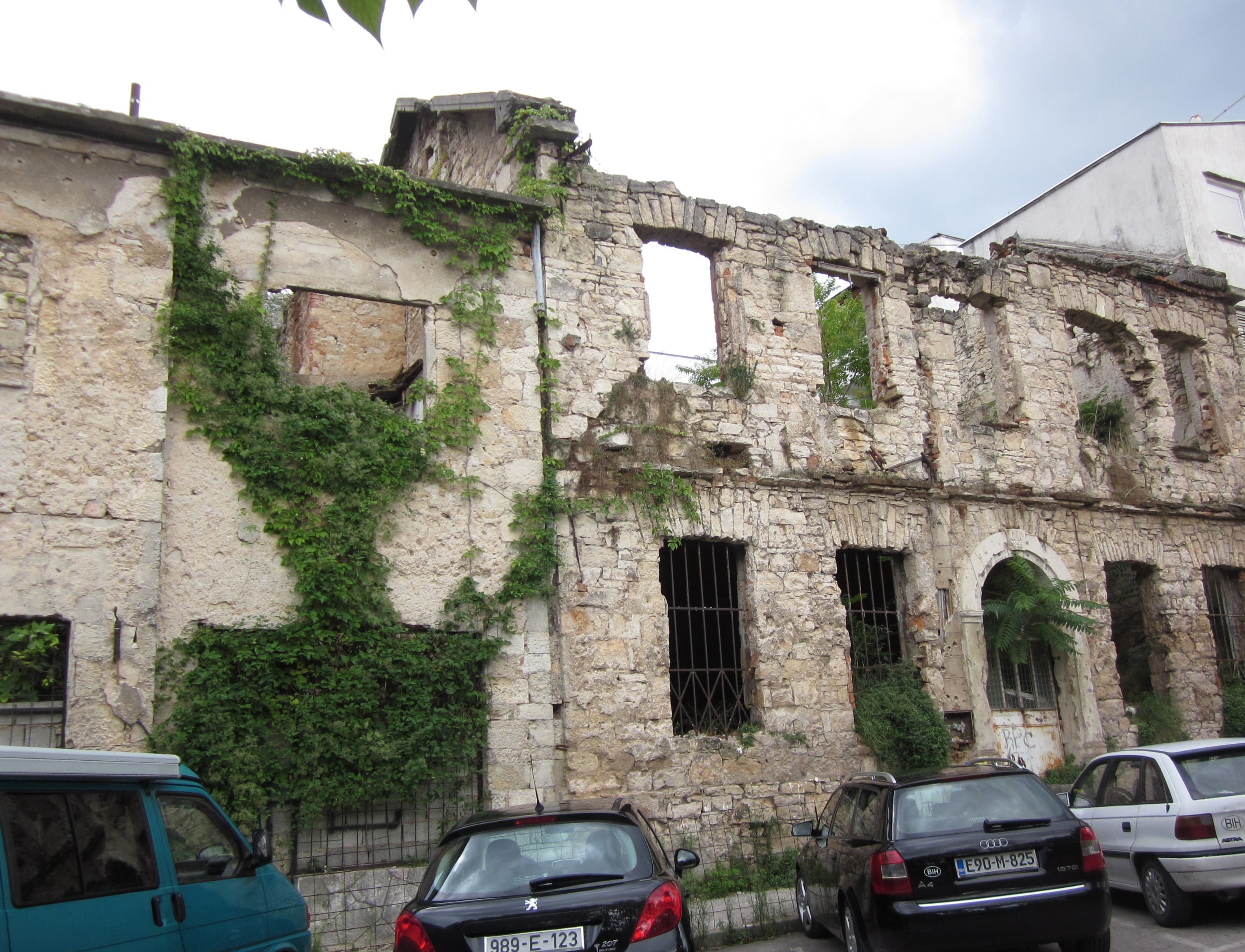 War Torn Building with Bullet Holes
