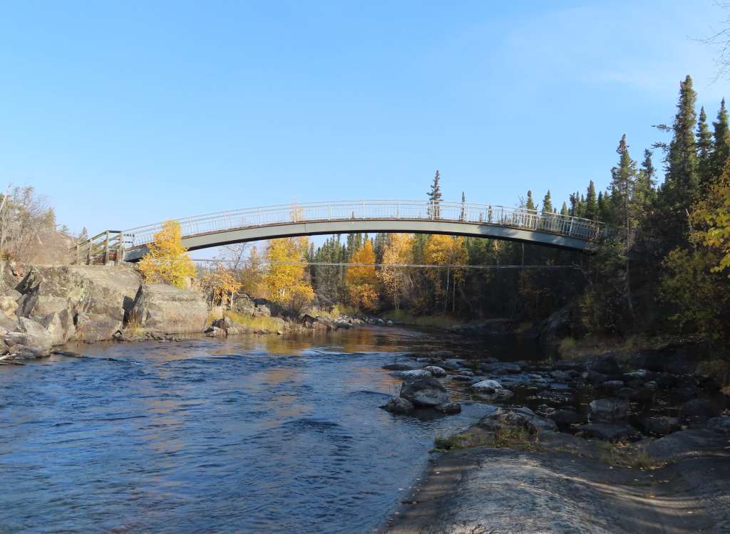 The bridge leads to the top of the falls.