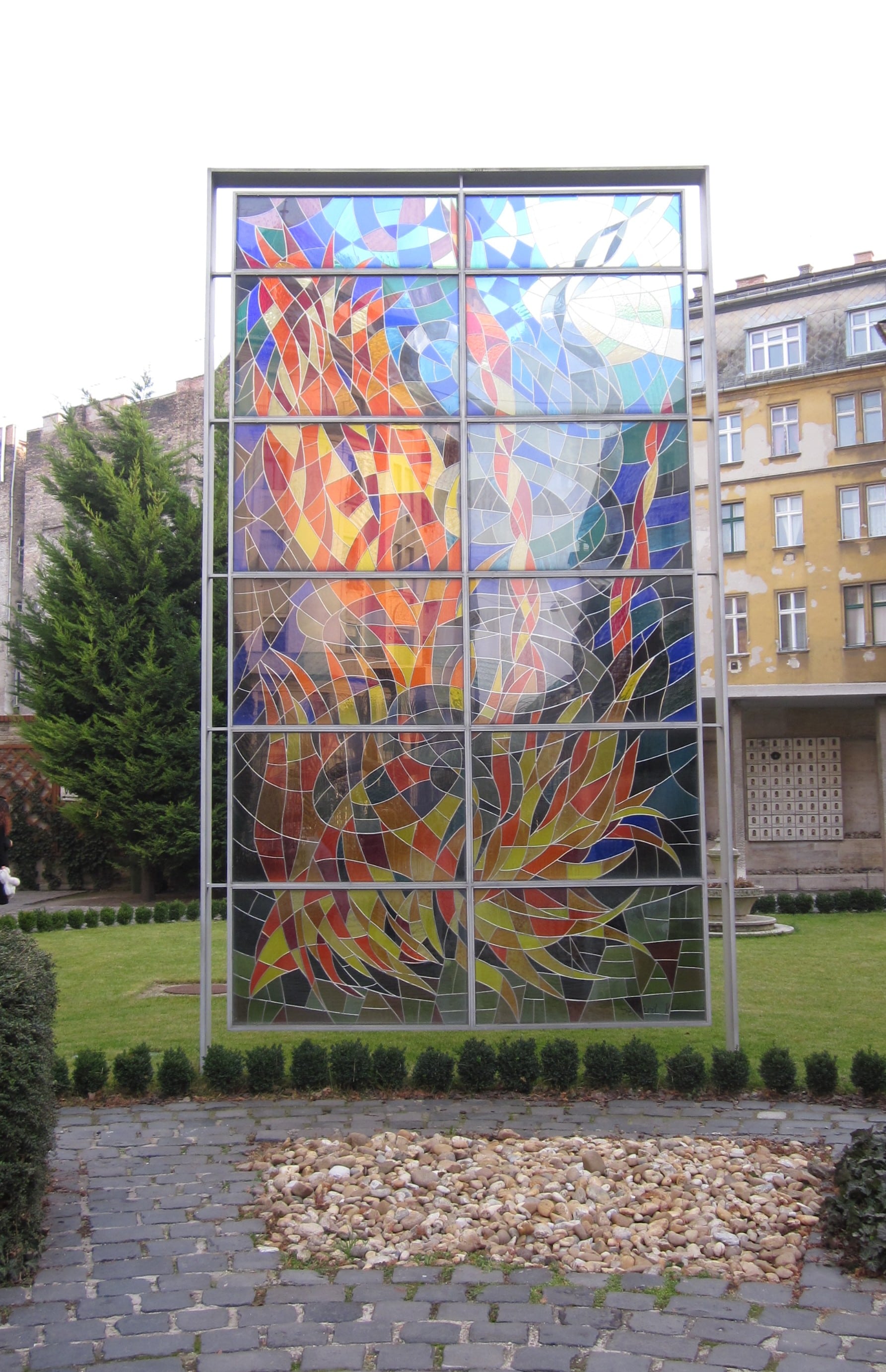 A beautiful stained-glass panel in the garden