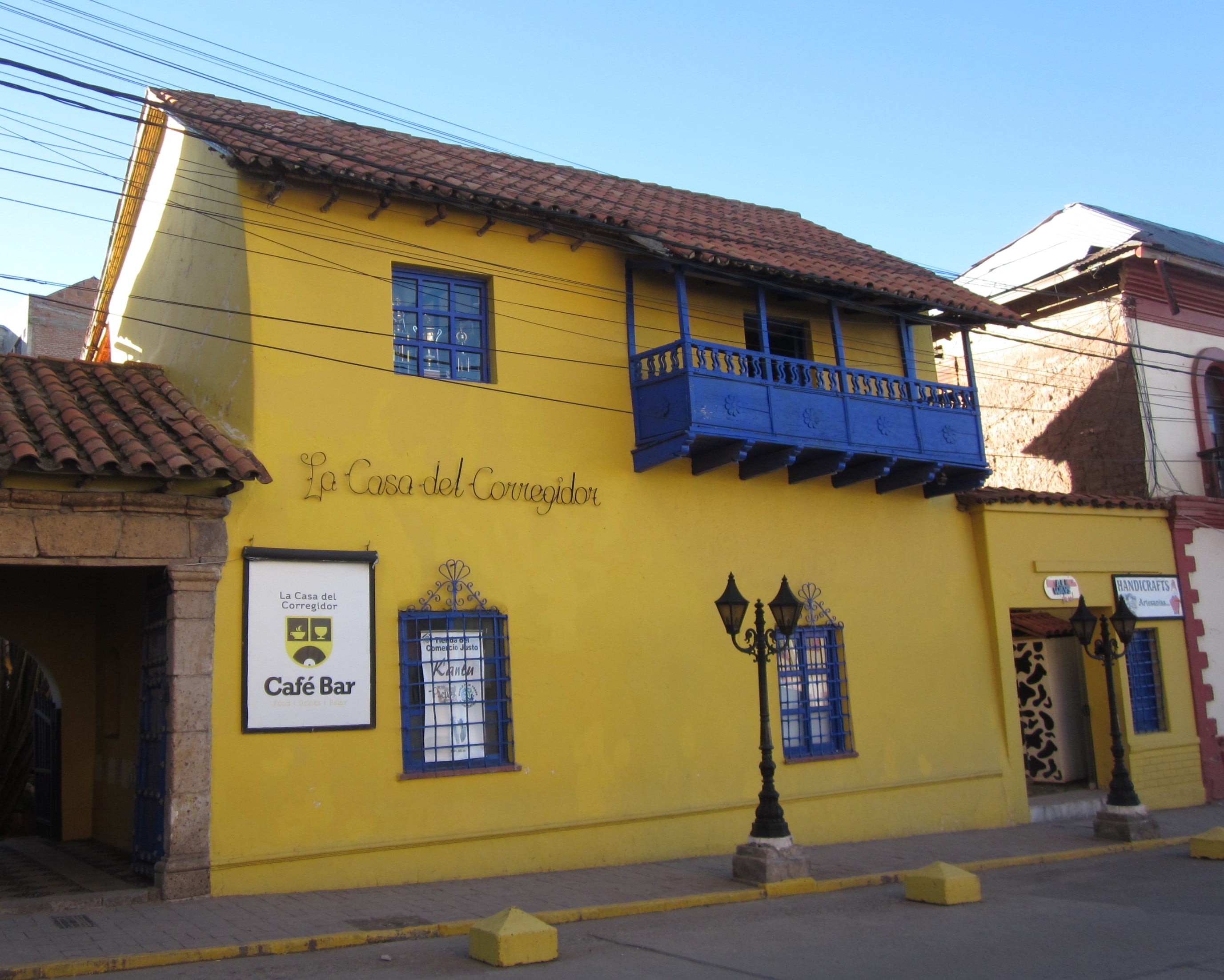 Yellow House of the Governor with a beautiful blue balcony