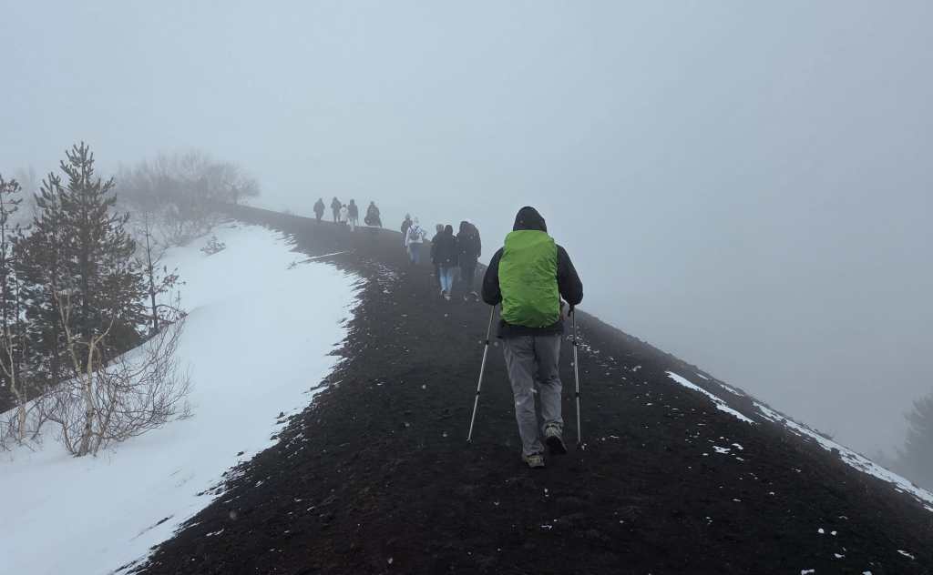 Climbing to reach the crater rim