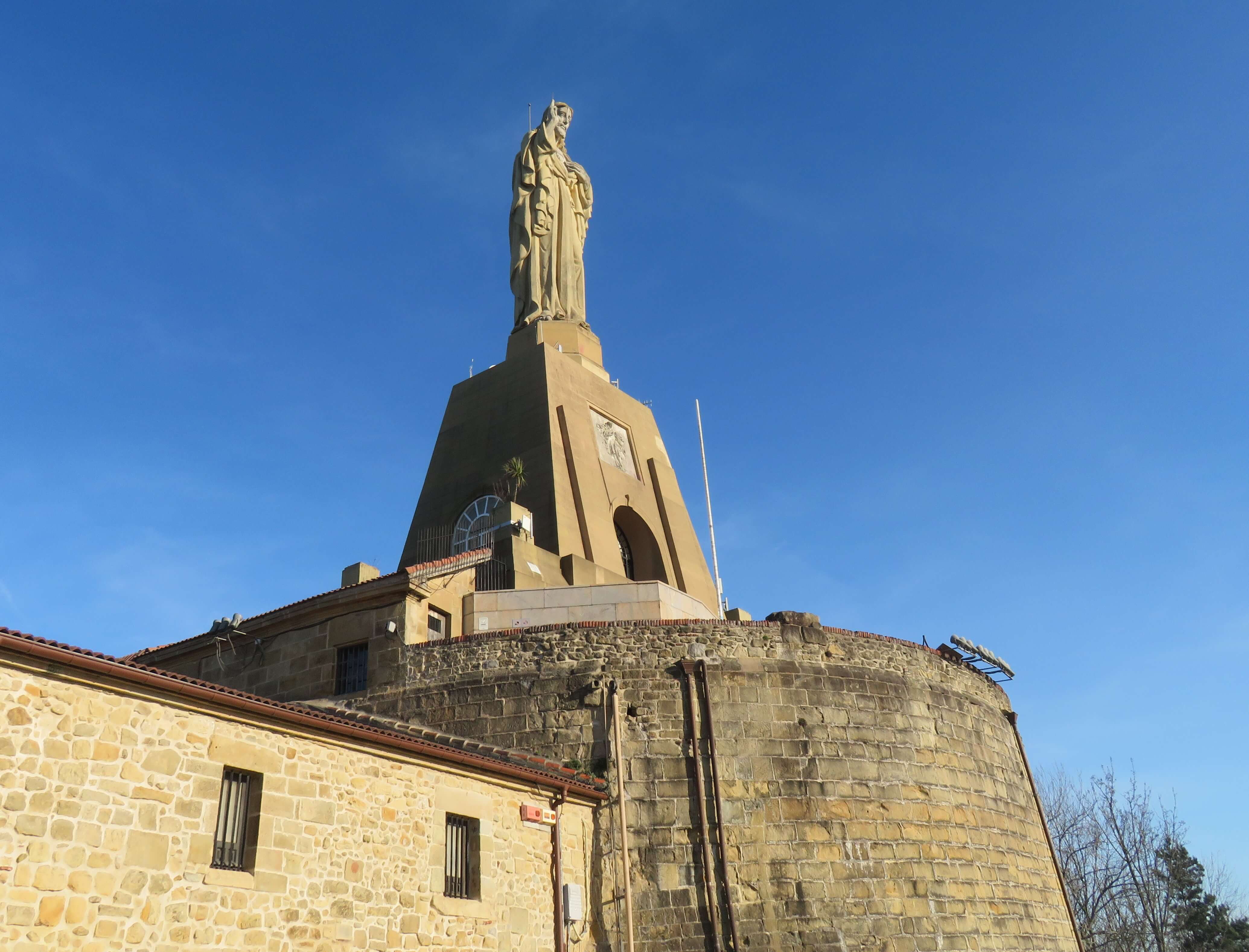 Jesus Christ statue overlooking the castle