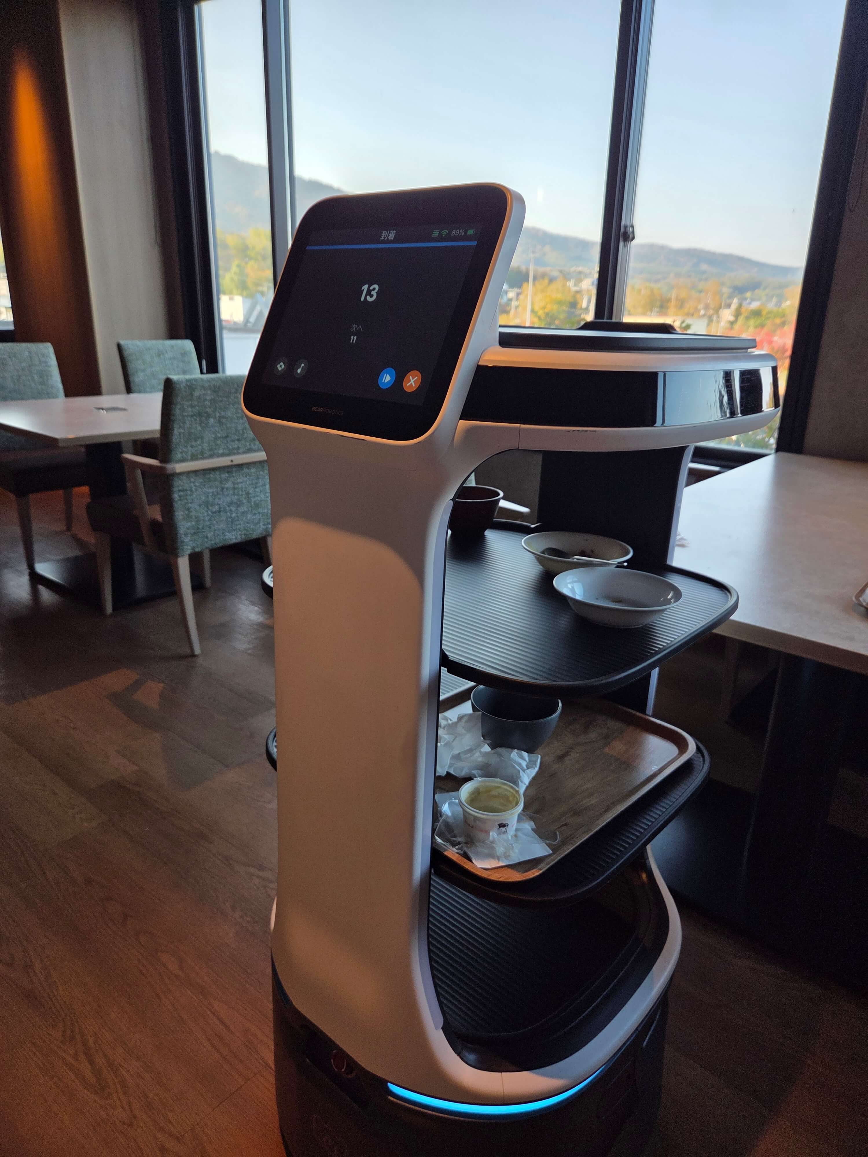 Robot collecting used cups and plates
